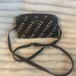 Guess cross body wallet.